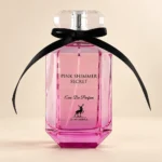 نمای بطری عطر الحمبرا پینک شیمر سکرت با زمینه کرم